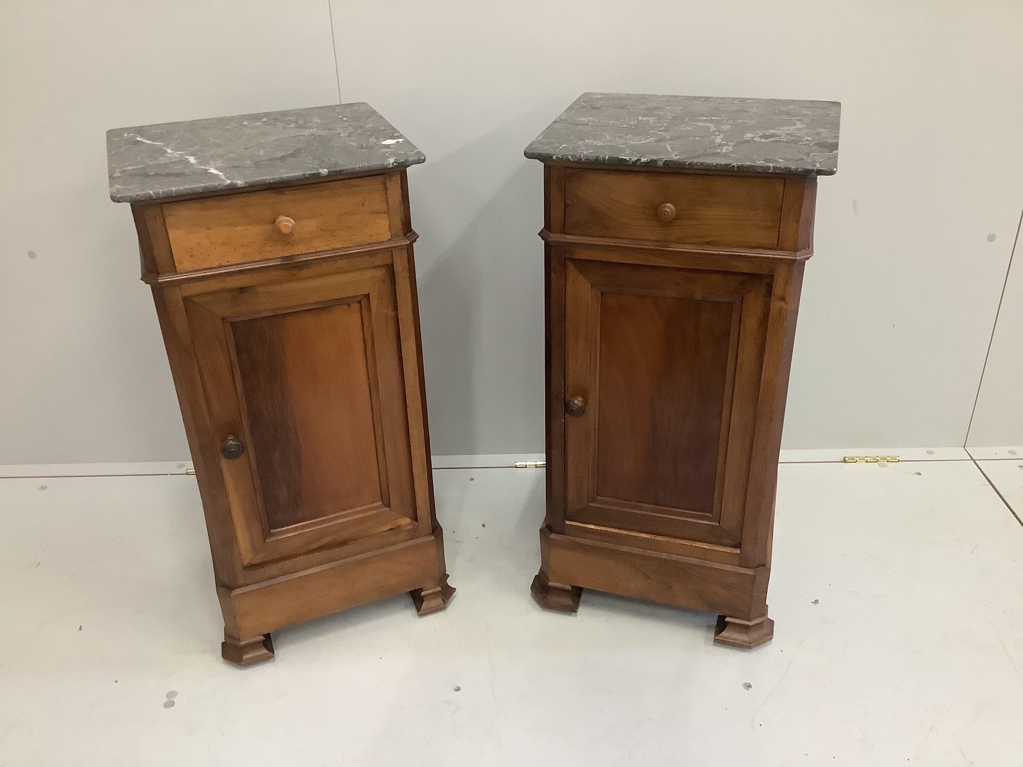 A pair of late 19th century French walnut bedside cabinets with grey marble tops, width 38cm